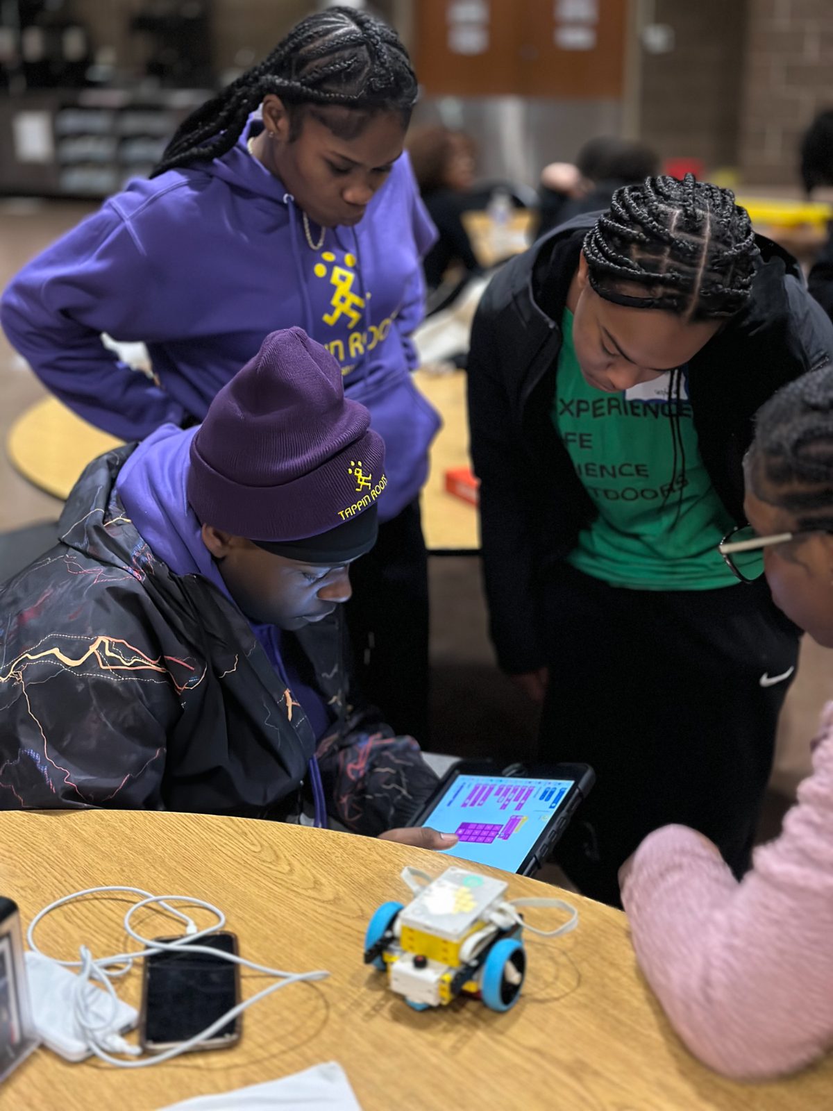Students coding together