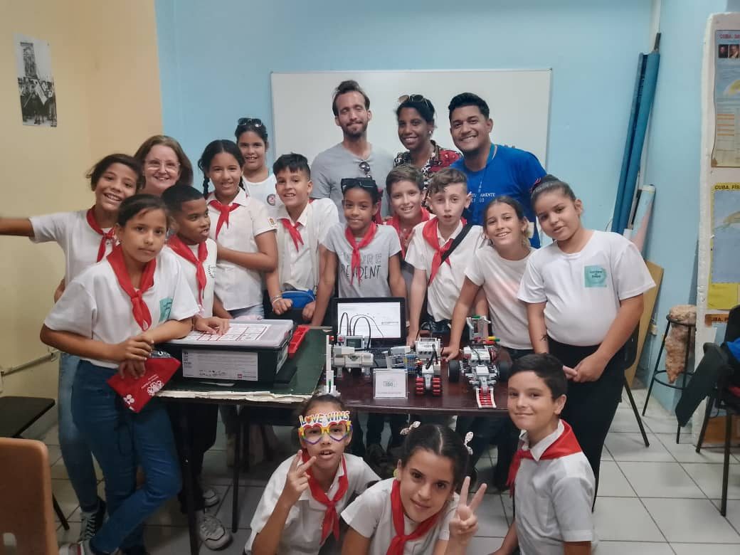 Students and mentors in Havana with their robots