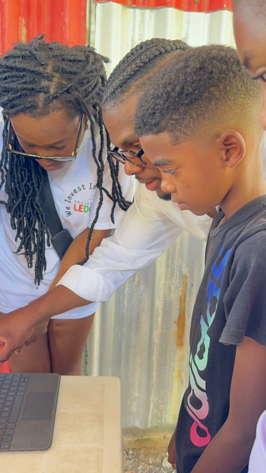Mentors working side by side with students