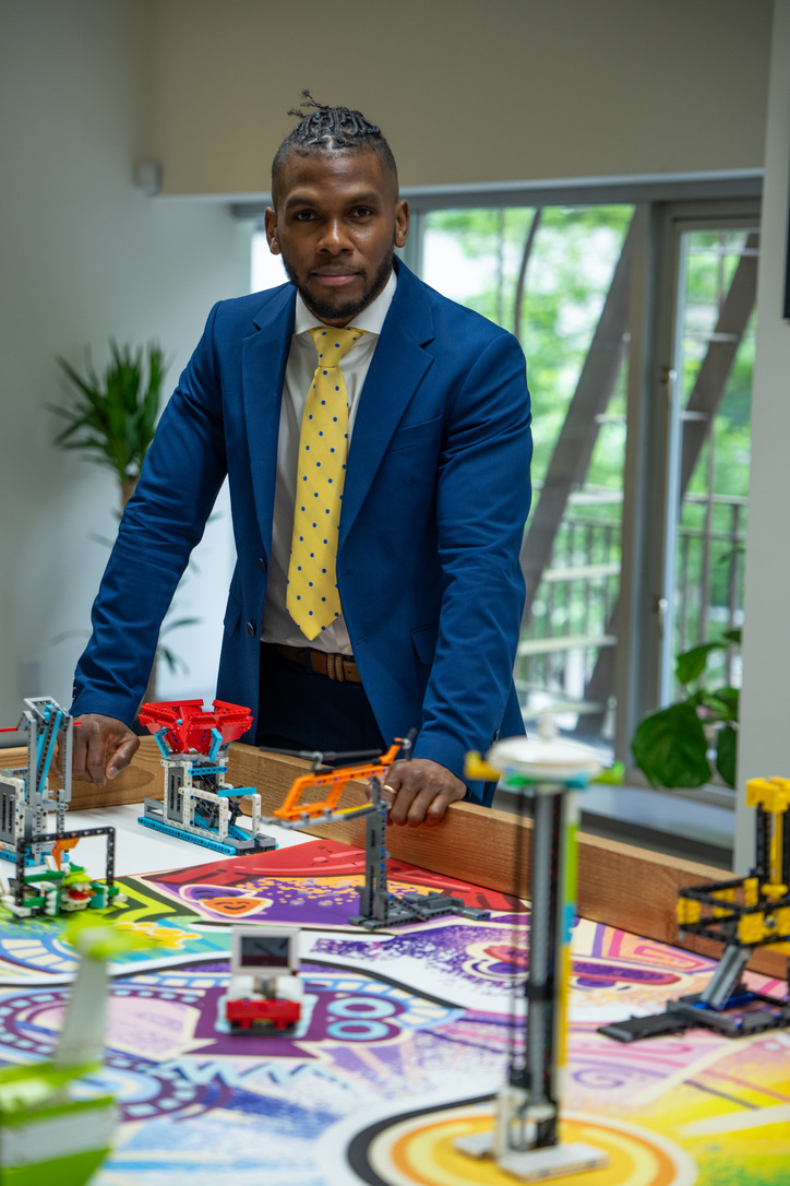 Fidel Ferrer at a robotics competition table