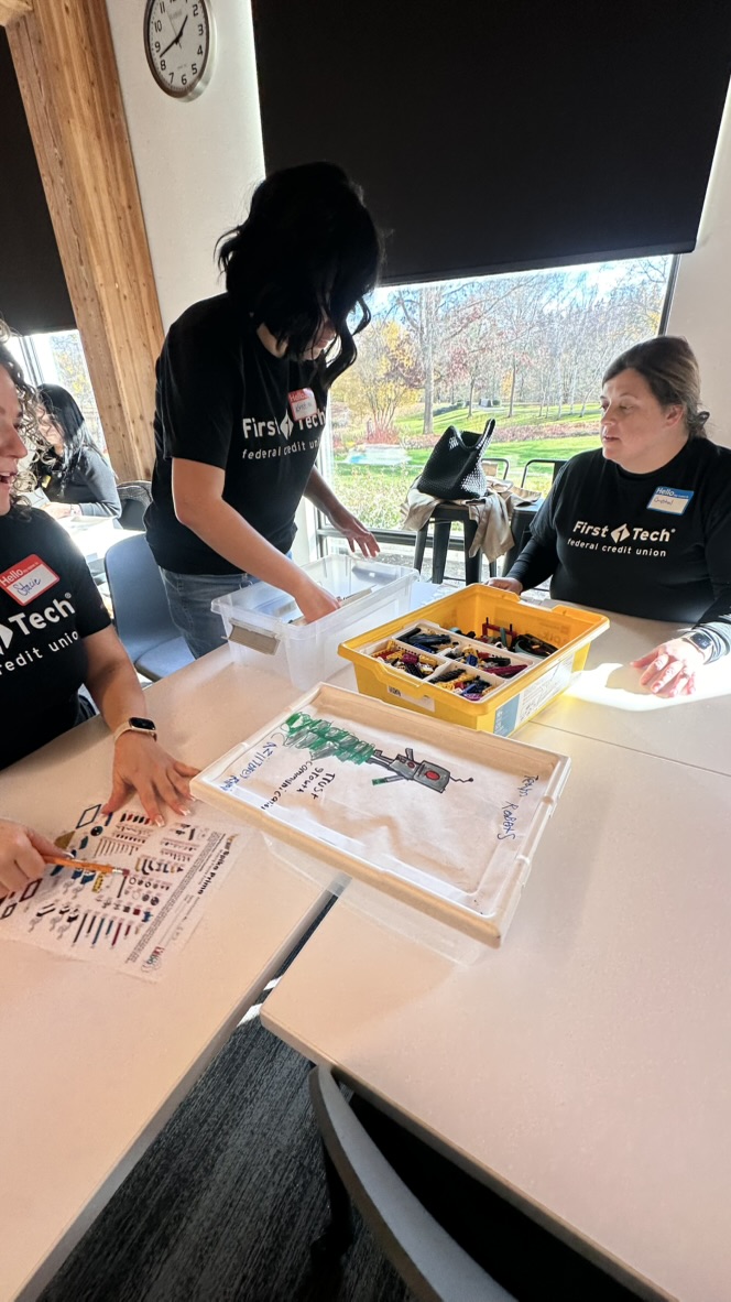 Volunteers organizing LEGO kits