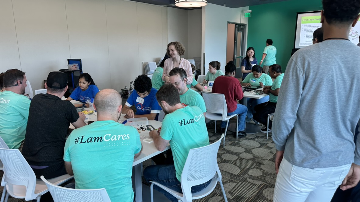 Lam Research volunteers building with students